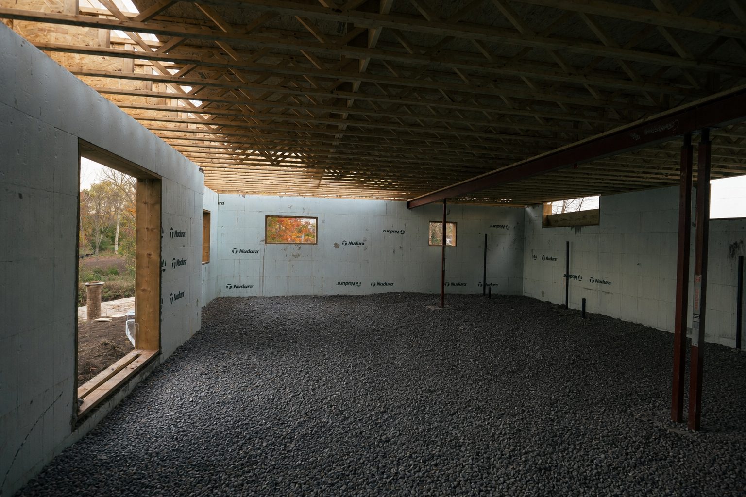ICF basement walls over a deep engineered gravel drainage plane