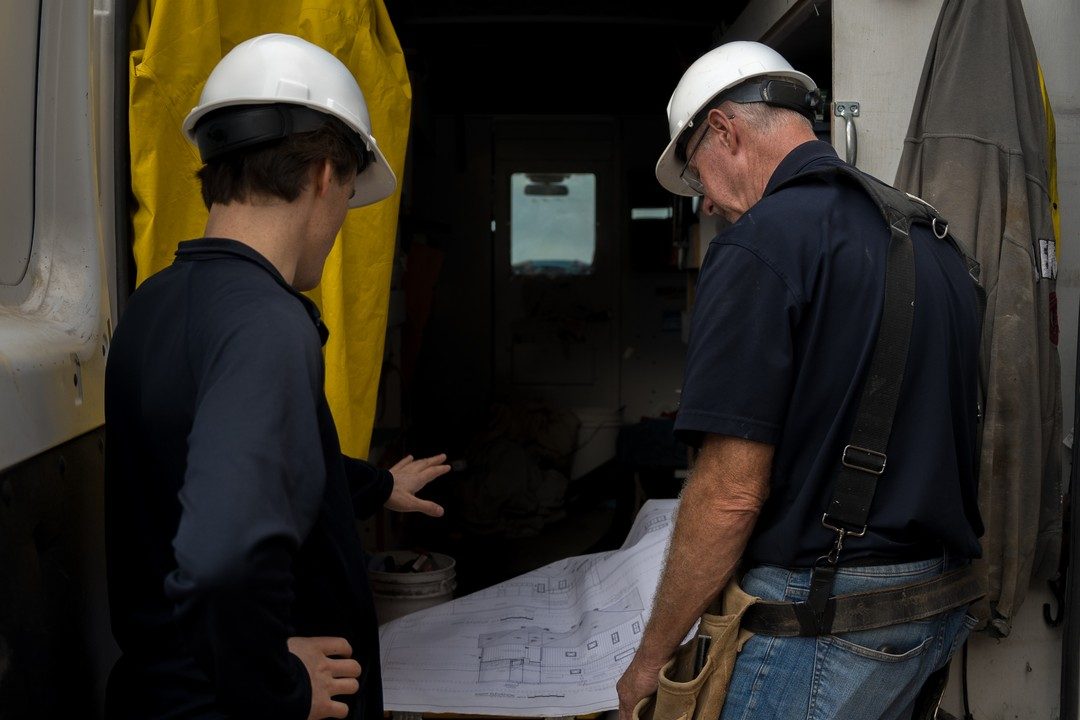 Reviewing construction drawings on site