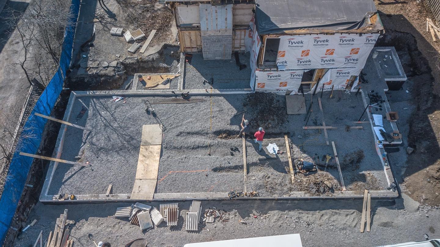 Aerial of ICF foundation forms over an engineered gravel drainage plane