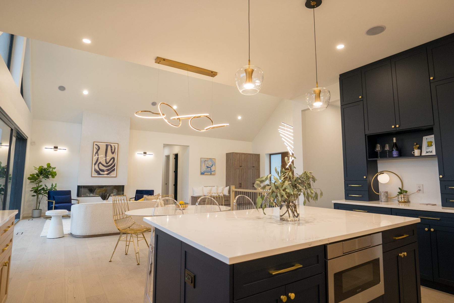 Bright kitchen with large island and pendant lighting