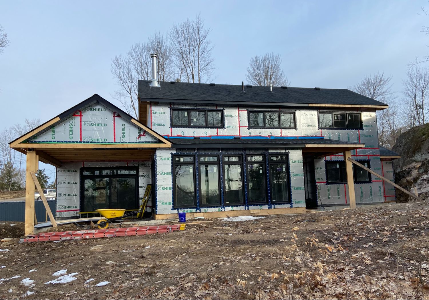 High-performance envelope going up with taped exterior insulation